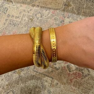 Gold cuff bracelet and gold stretchy bracelet